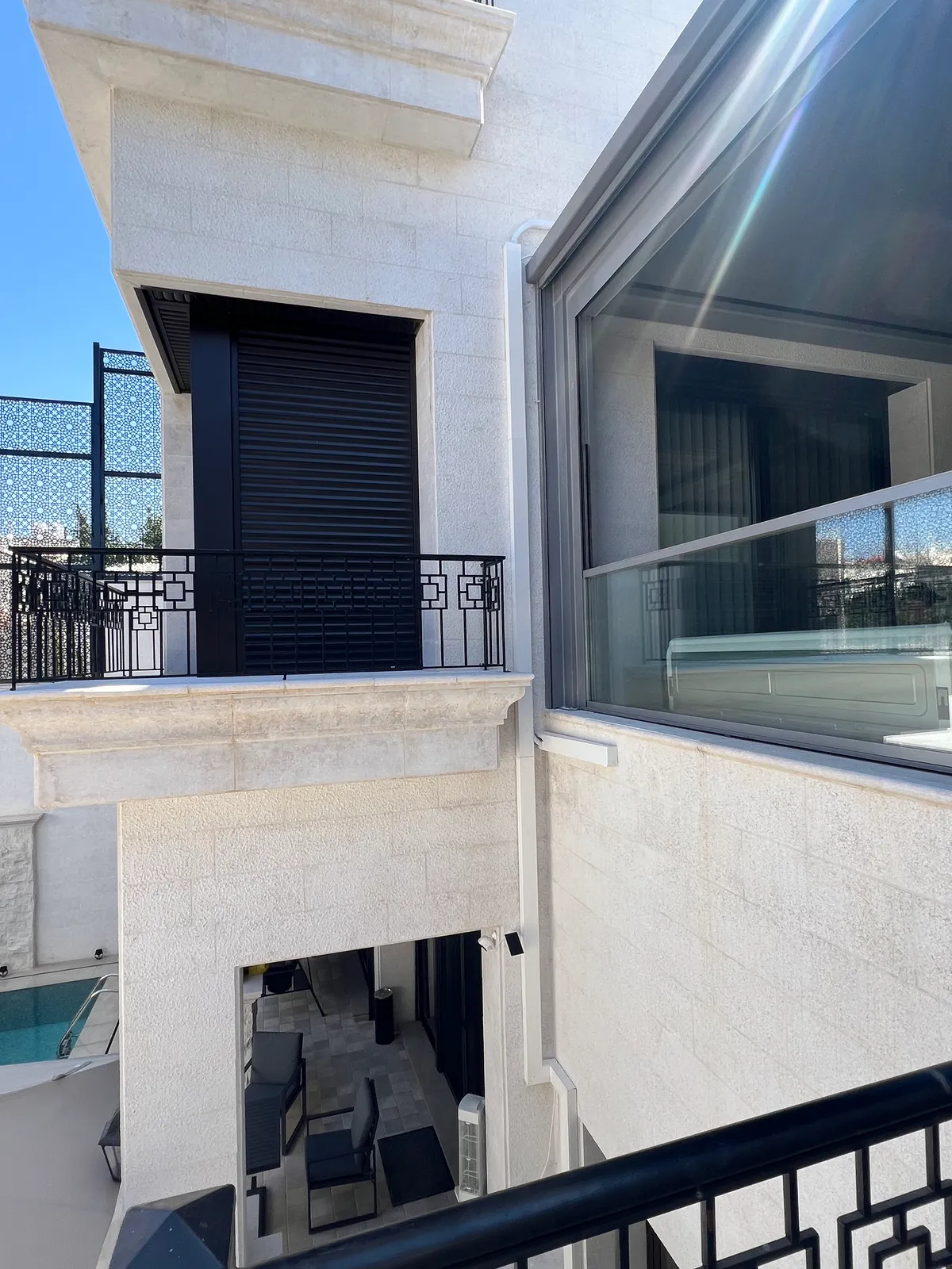 A modern stone villa in Jordan with a pool and TTC air conditioning installed